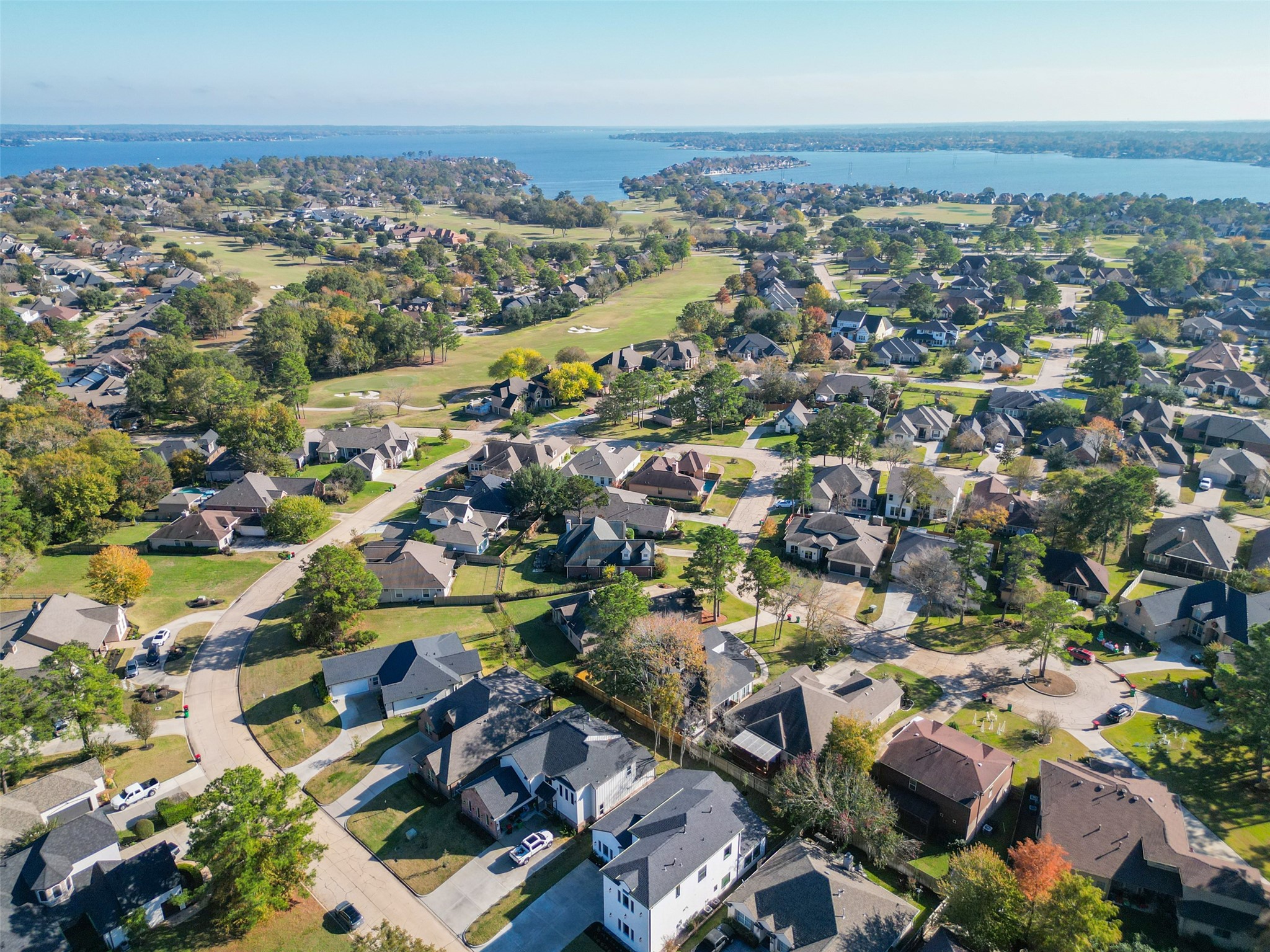 75 Wick Willow Road Montgomery, TX 77356 - Photo 36 of 46 an aerial view of a city with lots of residential buildings