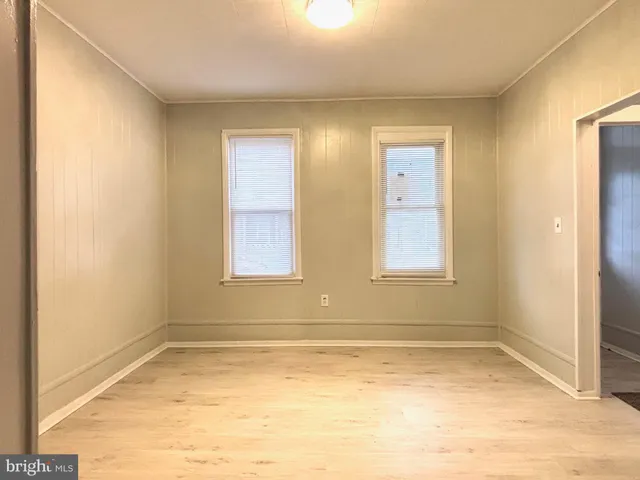 a view of an empty room with window