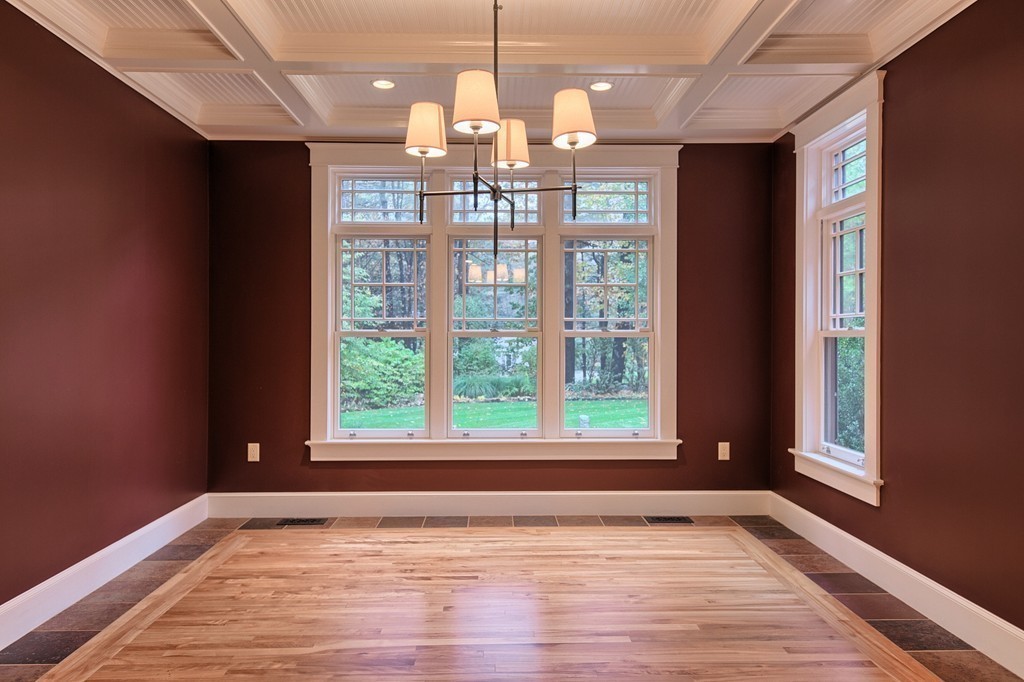 21 Valley Road Boxford, MA 01921 - Photo 13 of 28 a view of an empty room with wooden floor and a window