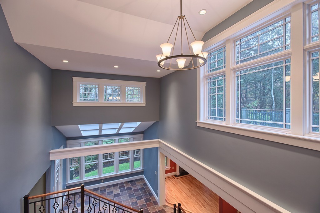 21 Valley Road Boxford, MA 01921 - Photo 16 of 28 a view of a room with windows and chandelier