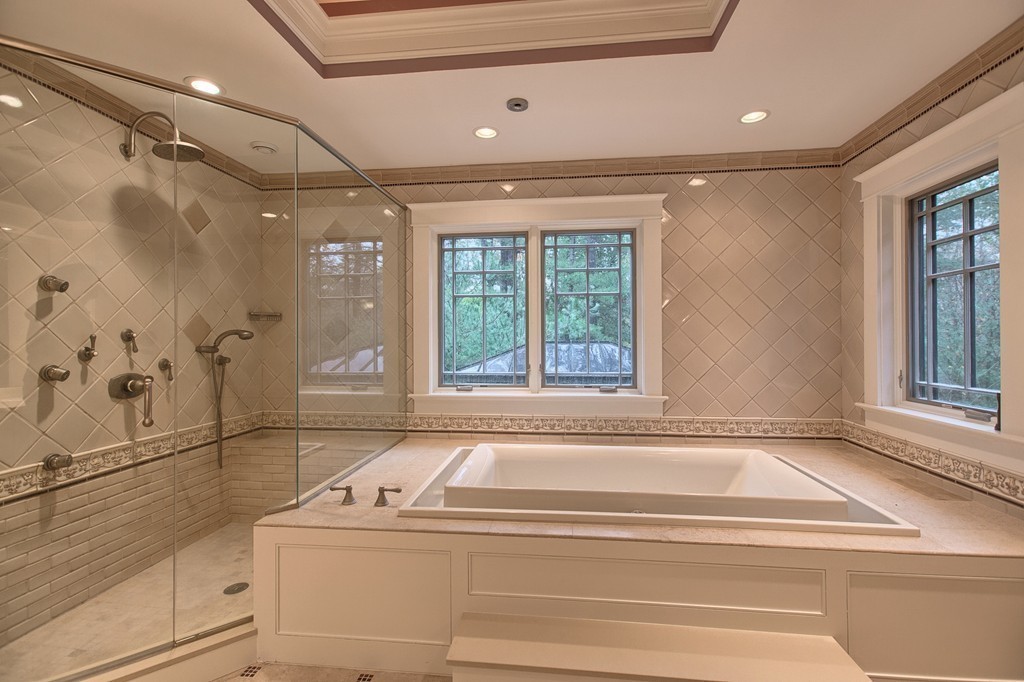 21 Valley Road Boxford, MA 01921 - Photo 23 of 28 a bathroom with a bathtub and a shower