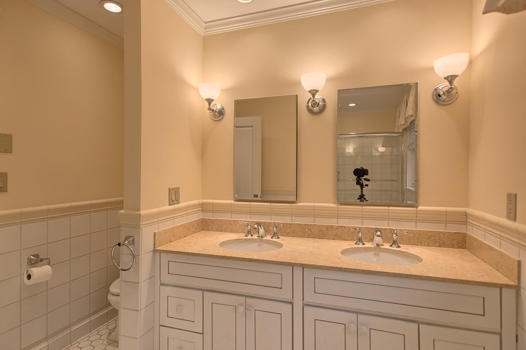 21 Valley Road Boxford, MA 01921 - Photo 25 of 28 a bathroom with a sink and a mirror