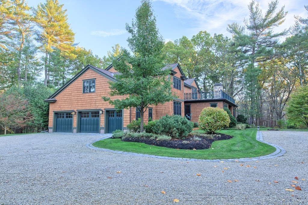 21 Valley Road Boxford, MA 01921 - Photo 4 of 28 a front view of a house with a yard and potted plants