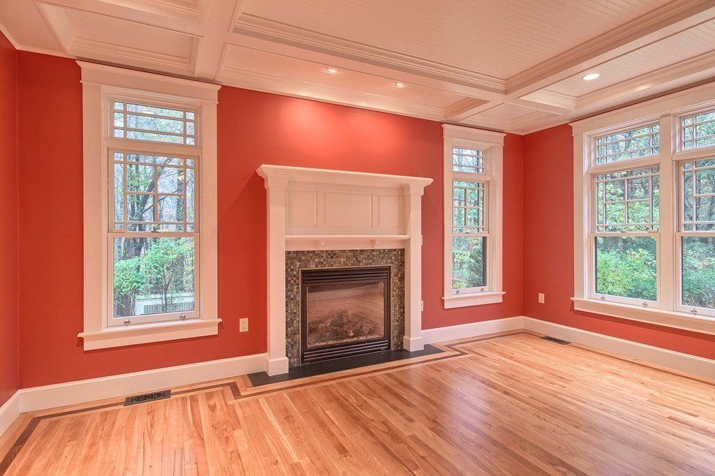 21 Valley Road Boxford, MA 01921 - Photo 6 of 28 a view of an empty room with wooden floor and a window