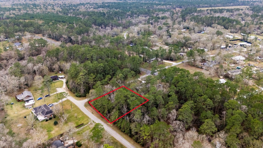 0 County Road 427 Loop Dayton, TX 77535 - Photo 3 of 19 Spacious 0.54-acre (appx) corner lot offering added privacy and flexibility, ideal for your future plans.
