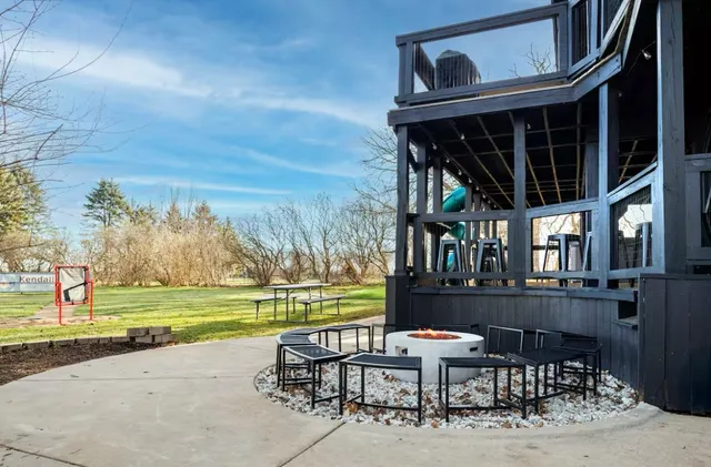 a view of a bathroom with a sink and wooden floor