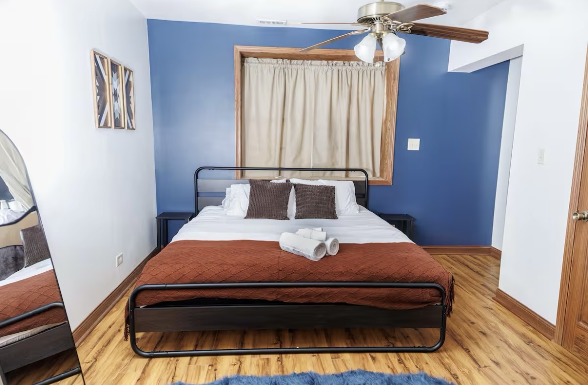 9439 Corneils Road Bristol, IL 60512 - Photo 35 of 44 a bedroom with a bed and a window