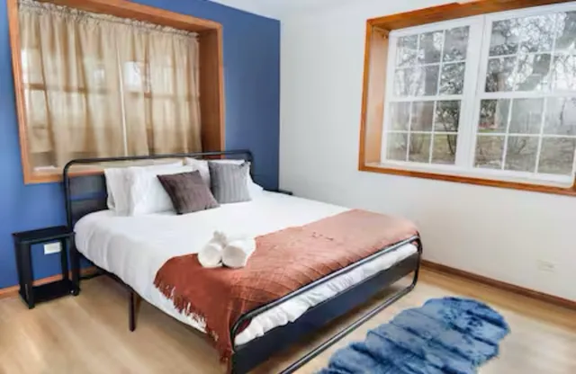 a room with a sink and cabinets