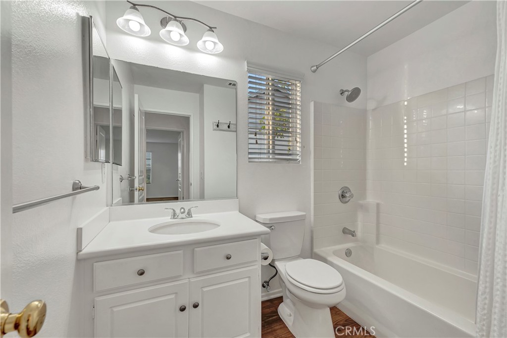 40 Three Vines Court Ladera Ranch, CA 92694 - Photo 18 of 28 a bathroom with a bathtub shower sink mirror and toilet
