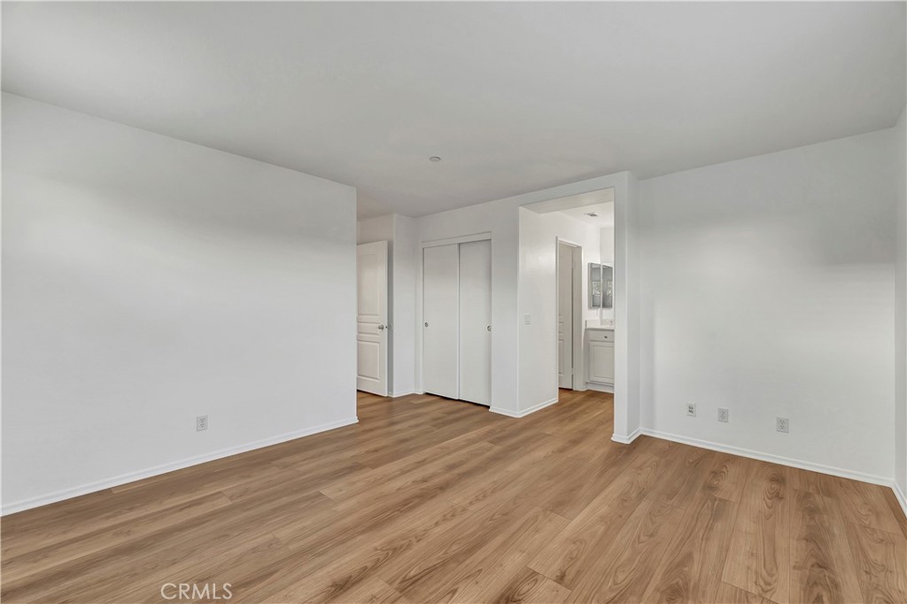 40 Three Vines Court Ladera Ranch, CA 92694 - Photo 20 of 28 a view of an empty room and wooden floor