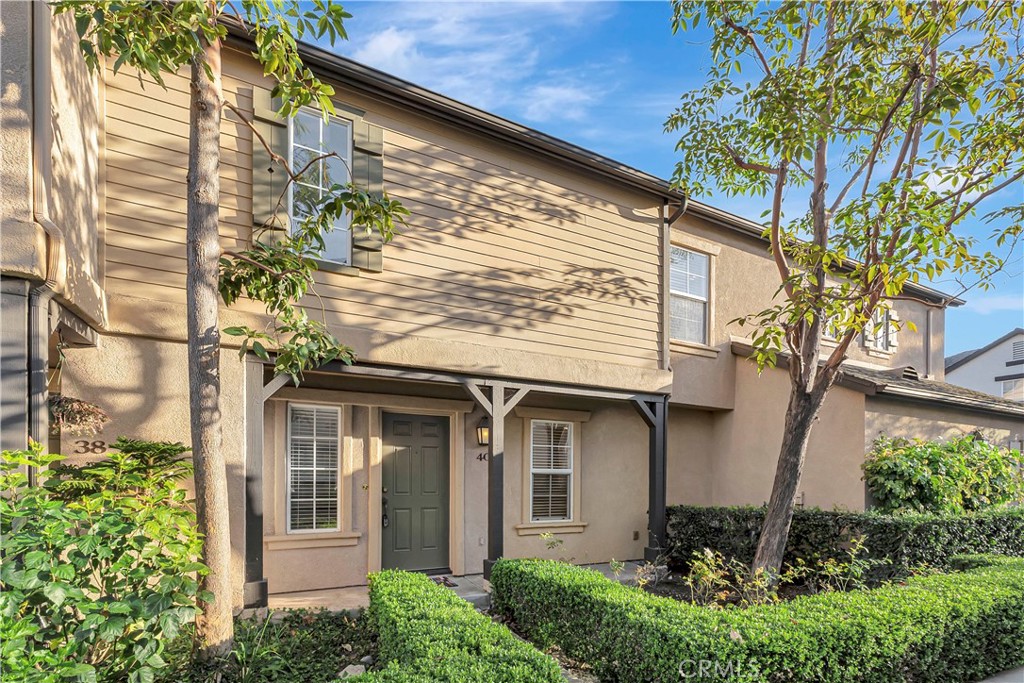 40 Three Vines Court Ladera Ranch, CA 92694 - Photo 28 of 28 a view of a house with a plants and a tree