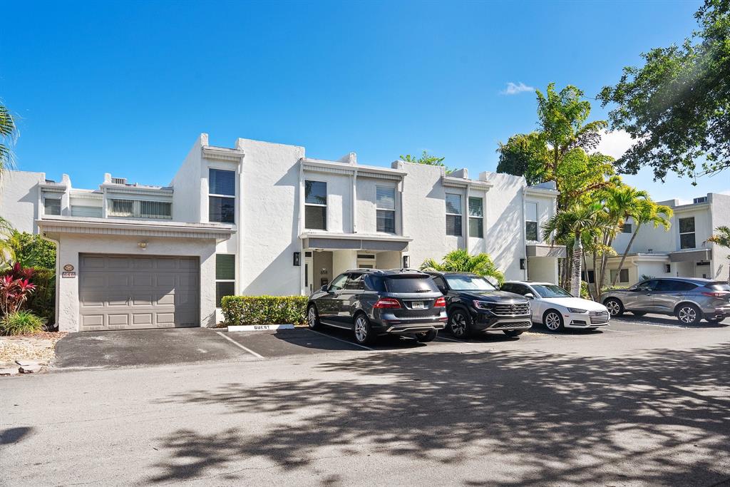 a car parked in front of a house