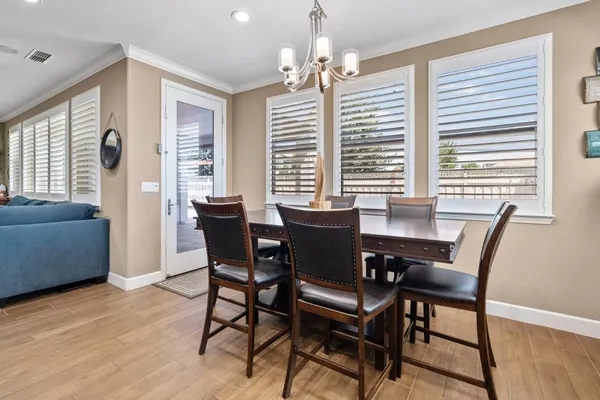 a bathroom with a sink double vanity granite and a mirror