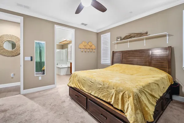 a view of a livingroom with an empty space and a fireplace