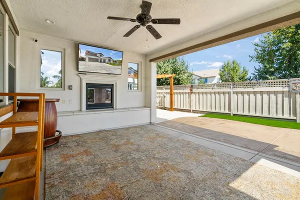 an aerial view of residential houses with outdoor space and river