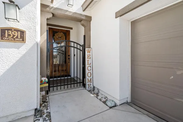 a view of a front door and outdoor space