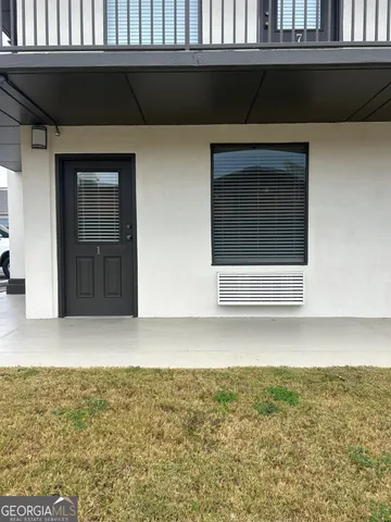 a view of wooden floor and a sink