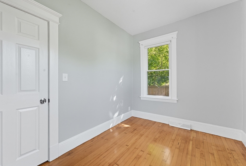 33 Taber Street Springfield, MA 01118 - Photo 21 of 39 an empty room with a window