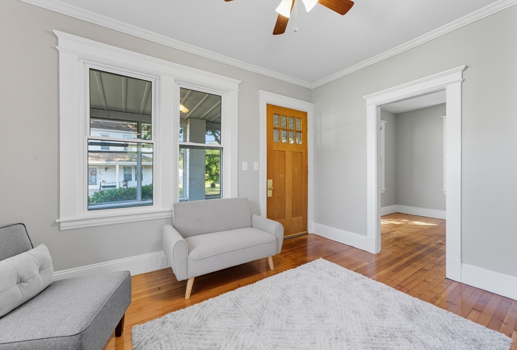 33 Taber Street Springfield, MA 01118 - Photo 9 of 39 a living room with furniture and a window