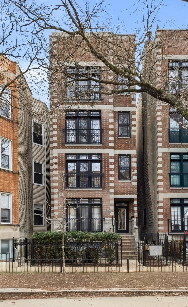 3537 North Reta Avenue, Unit 2 Chicago, IL 60657 - Photo 1 of 2 a front view of a building with street view