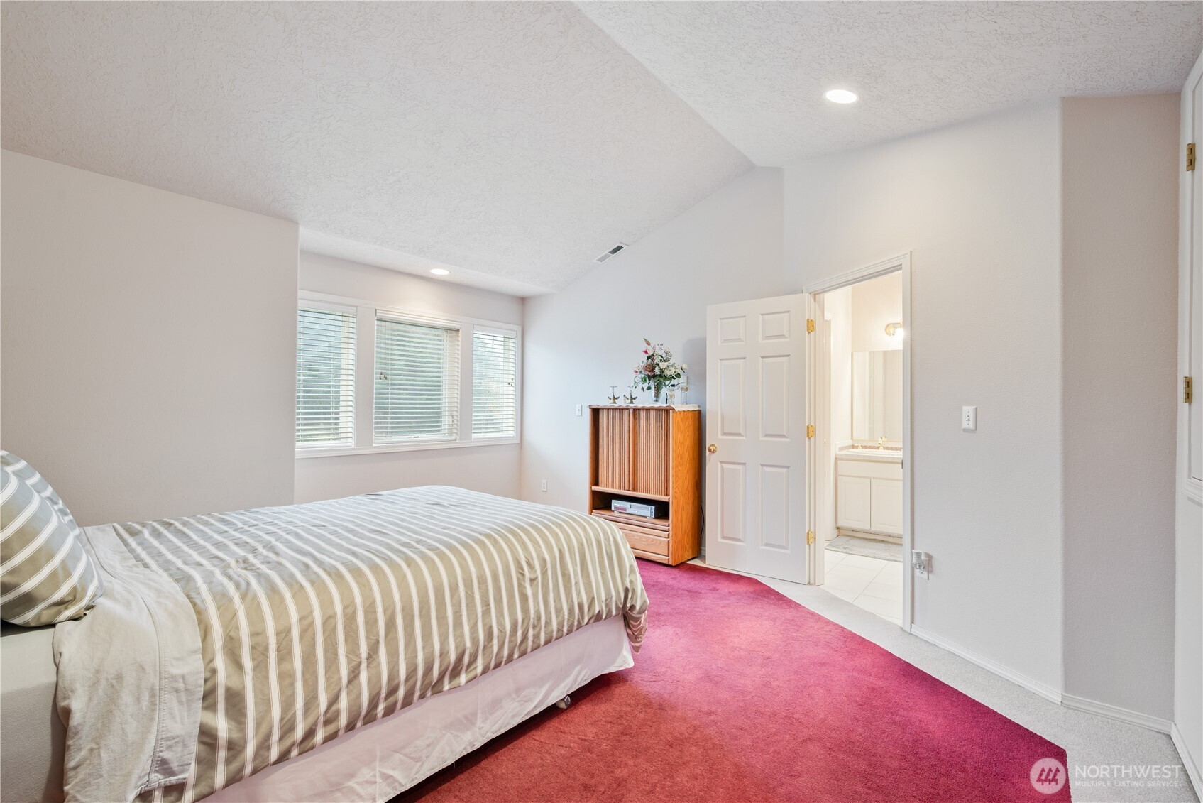 214 St James Court Longview, WA 98632 - Photo 12 of 40 a bedroom with a bed and a window