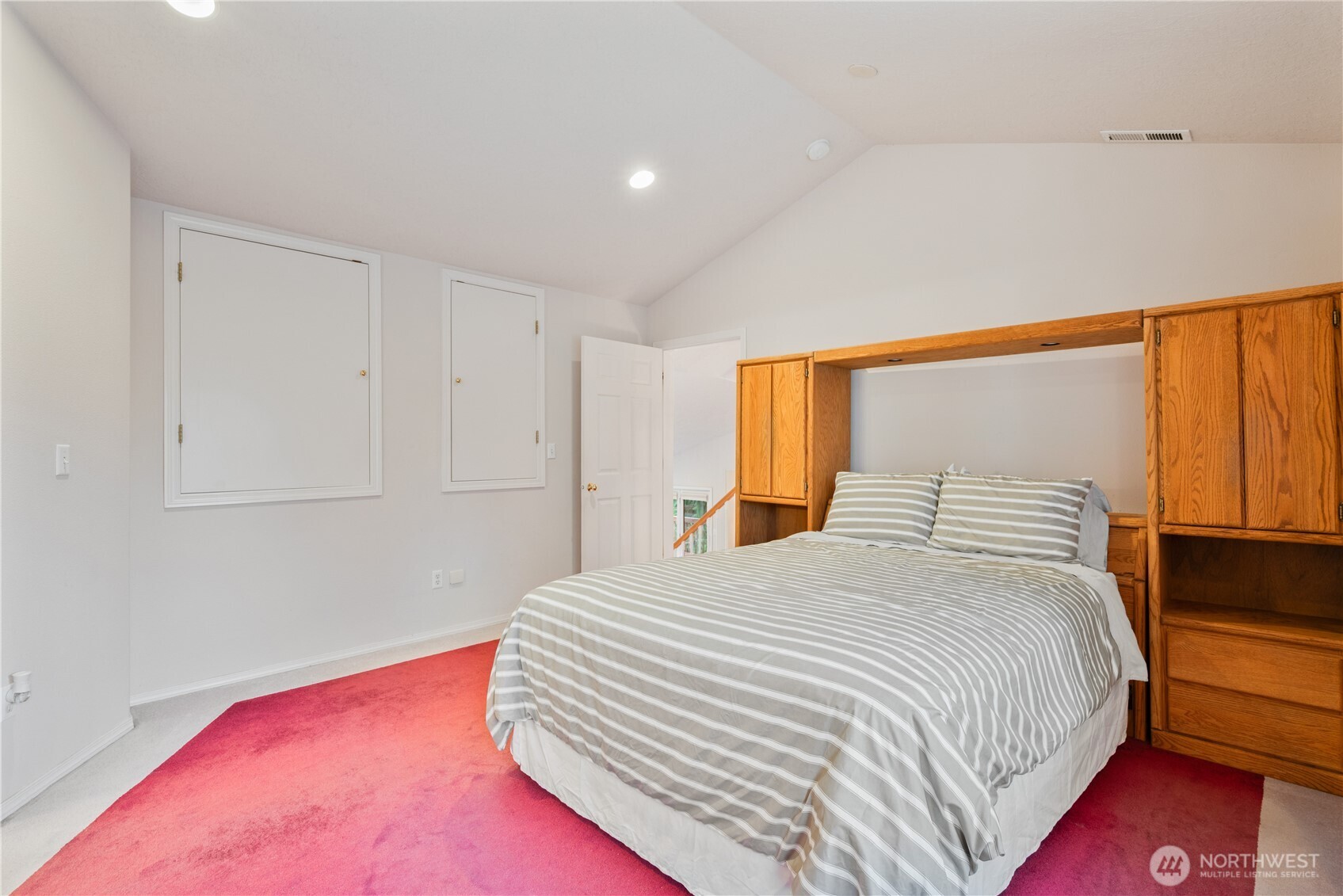 214 St James Court Longview, WA 98632 - Photo 13 of 40 a bedroom with a bed and a potted plant