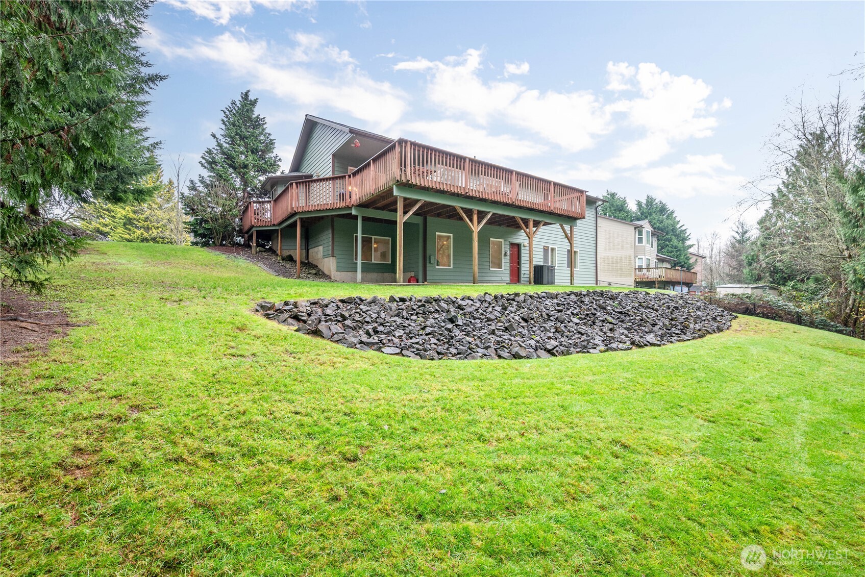 214 St James Court Longview, WA 98632 - Photo 31 of 40 a front view of a house with a garden