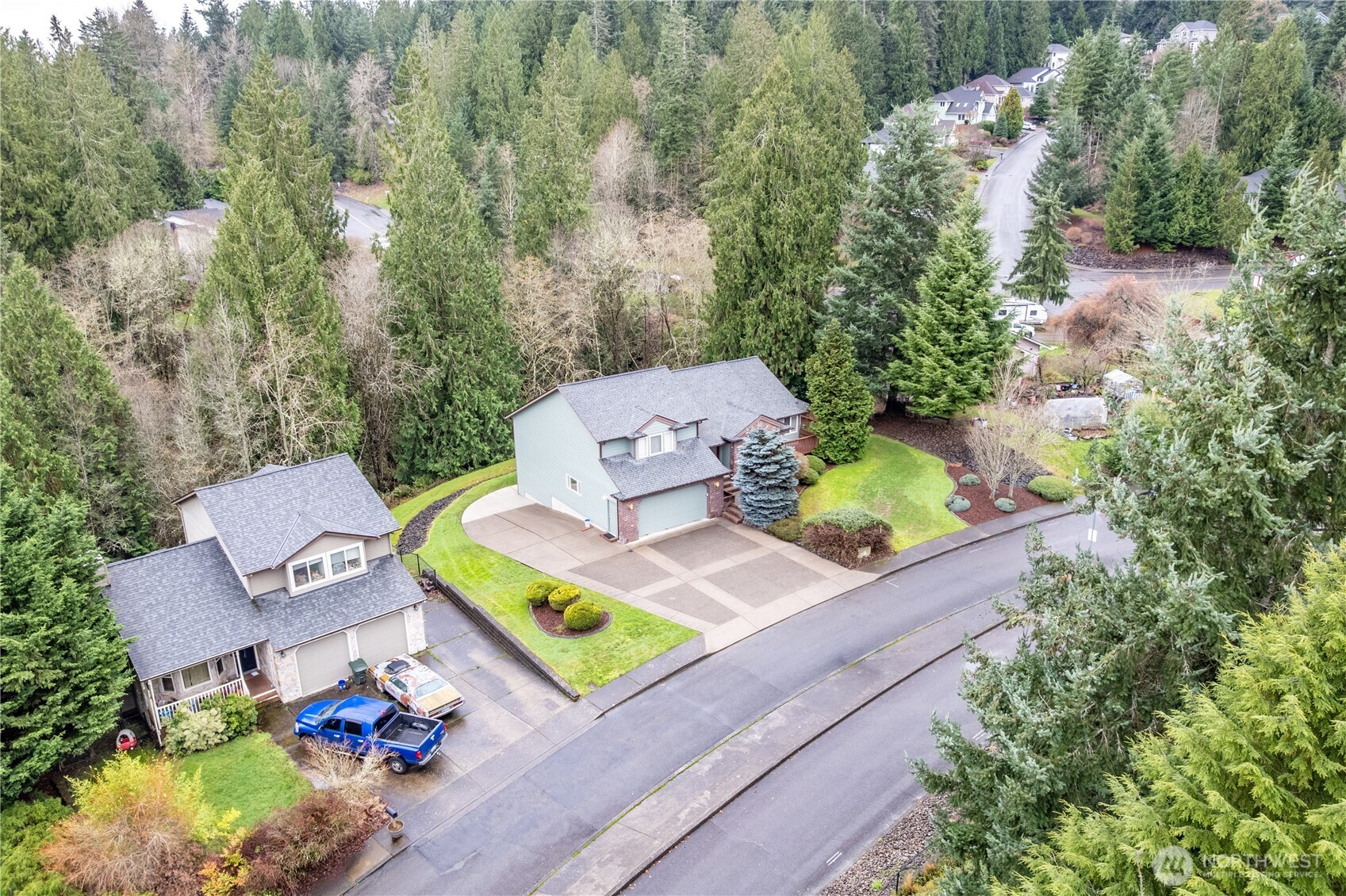 214 St James Court Longview, WA 98632 - Photo 36 of 40 an aerial view of a house with a garden and patio