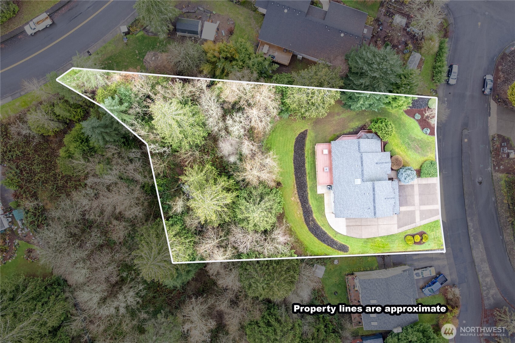 214 St James Court Longview, WA 98632 - Photo 37 of 40 an aerial view of a house with a swimming pool