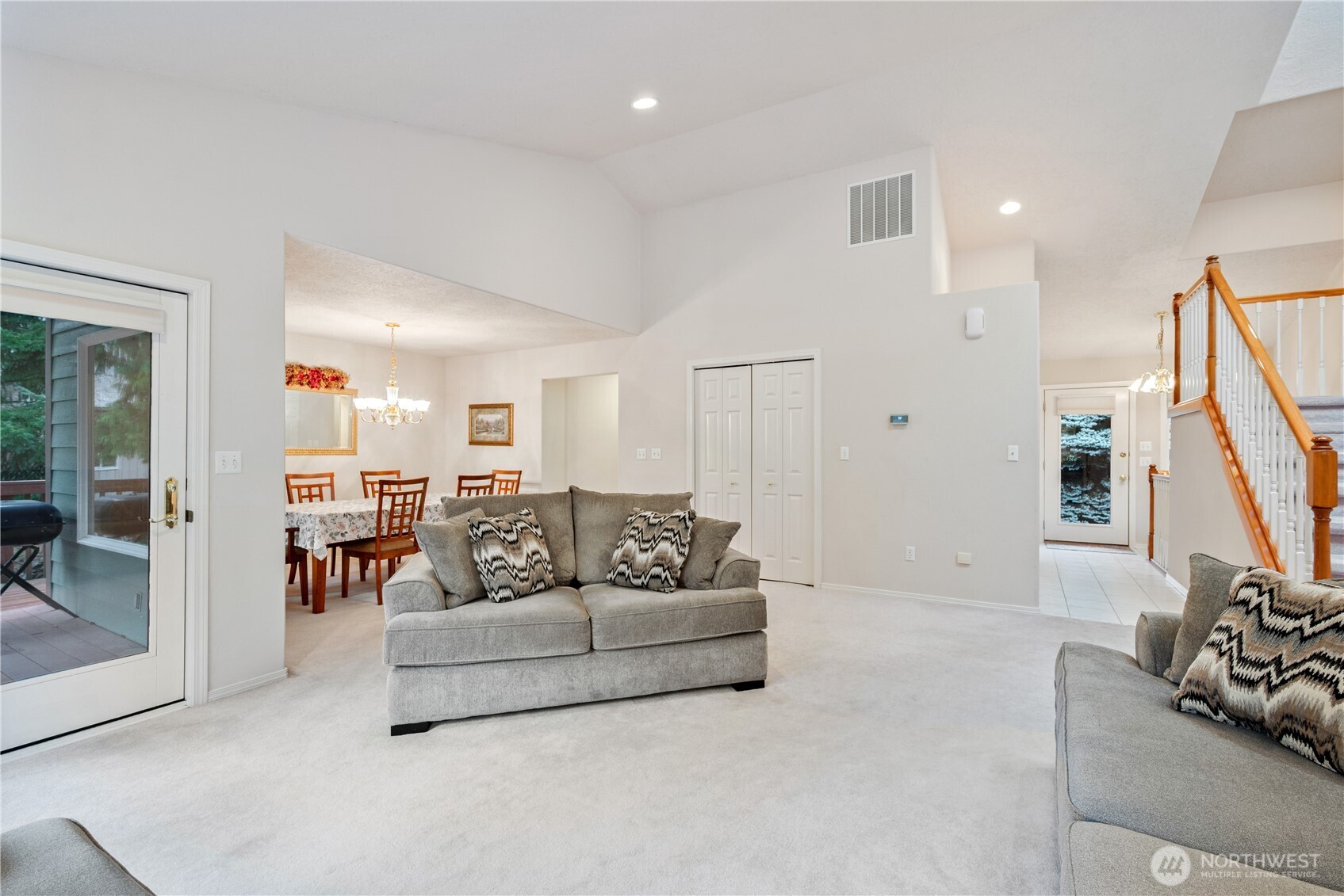 214 St James Court Longview, WA 98632 - Photo 4 of 40 a living room with furniture and a flat screen tv