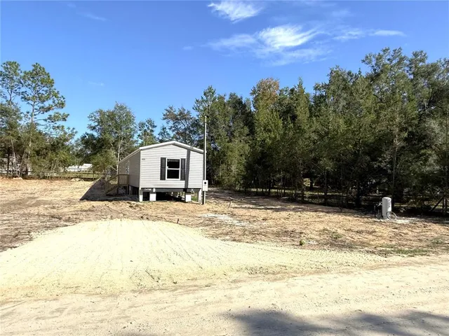 a white house with a outdoor space