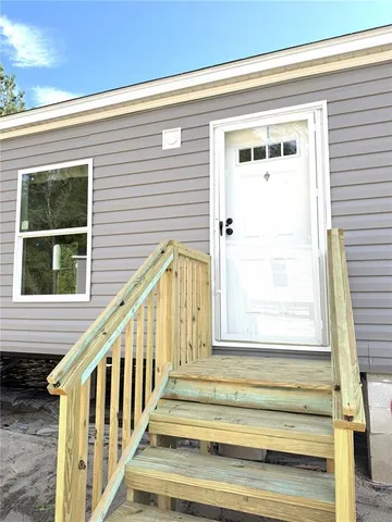 a view of entryway with a front door