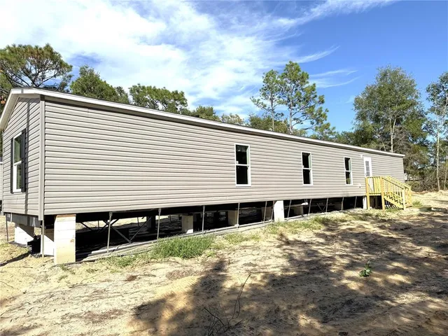 a view of a house with a patio
