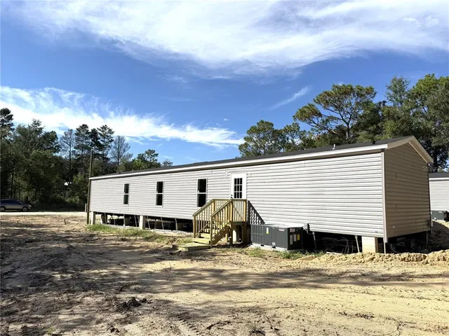 a view of a house with a patio