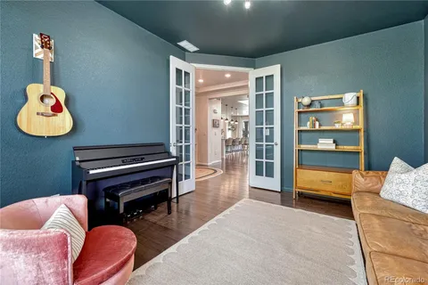 a bedroom with bed and a window