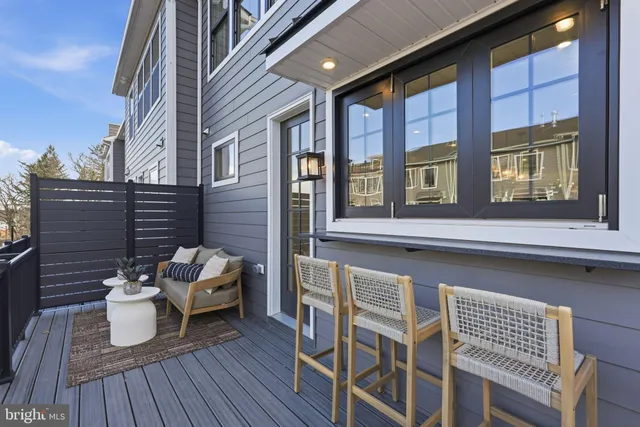 a view of a two chairs in the roof deck
