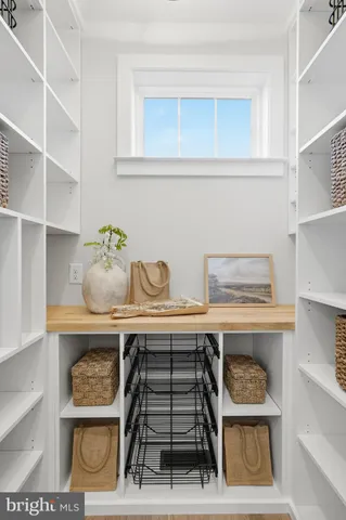 a kitchen with a stove and cabinets