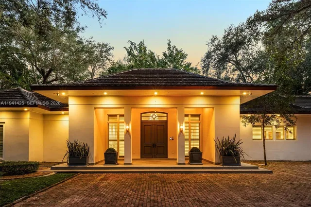 a front view of house with a yard