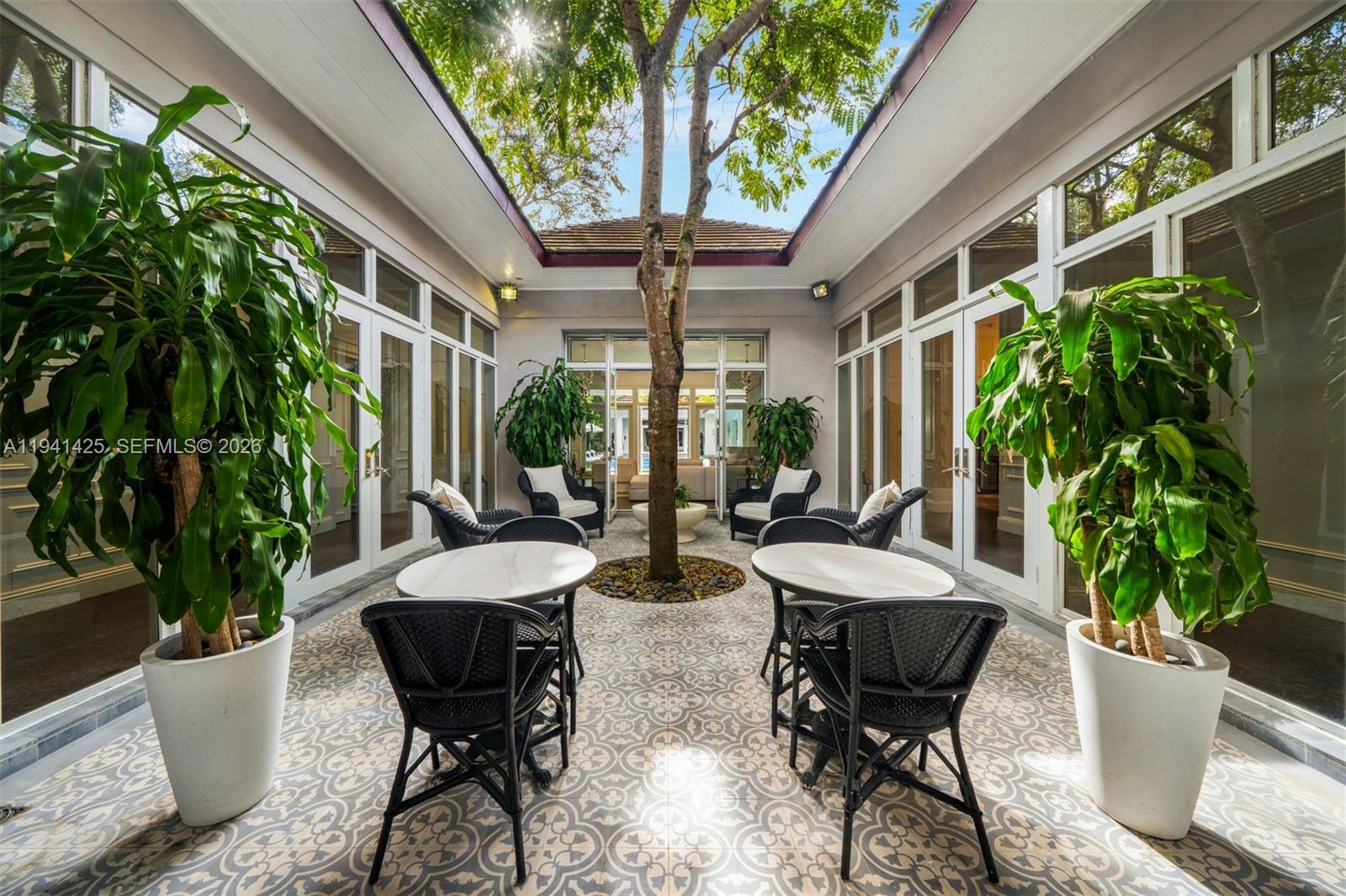 4100 Kiaora Street Miami, FL 33133 - Photo 14 of 26 a view of an outdoor space with furniture and garden