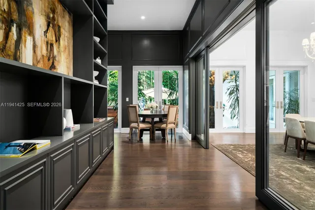 a lobby with furniture and window