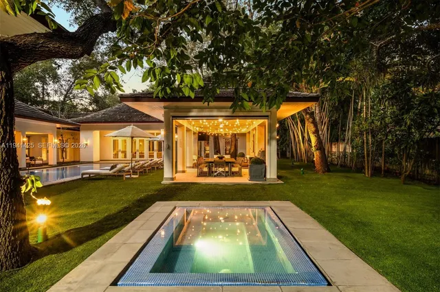 a view of swimming pool with lounge chair