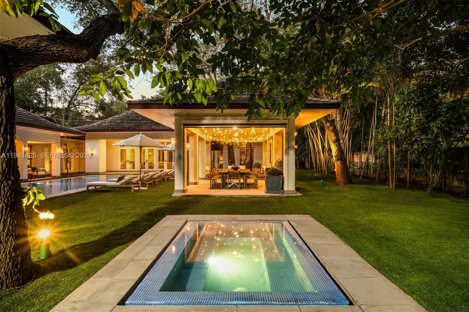 4100 Kiaora Street Miami, FL 33133 - Photo 2 of 26 a view of swimming pool with lounge chair