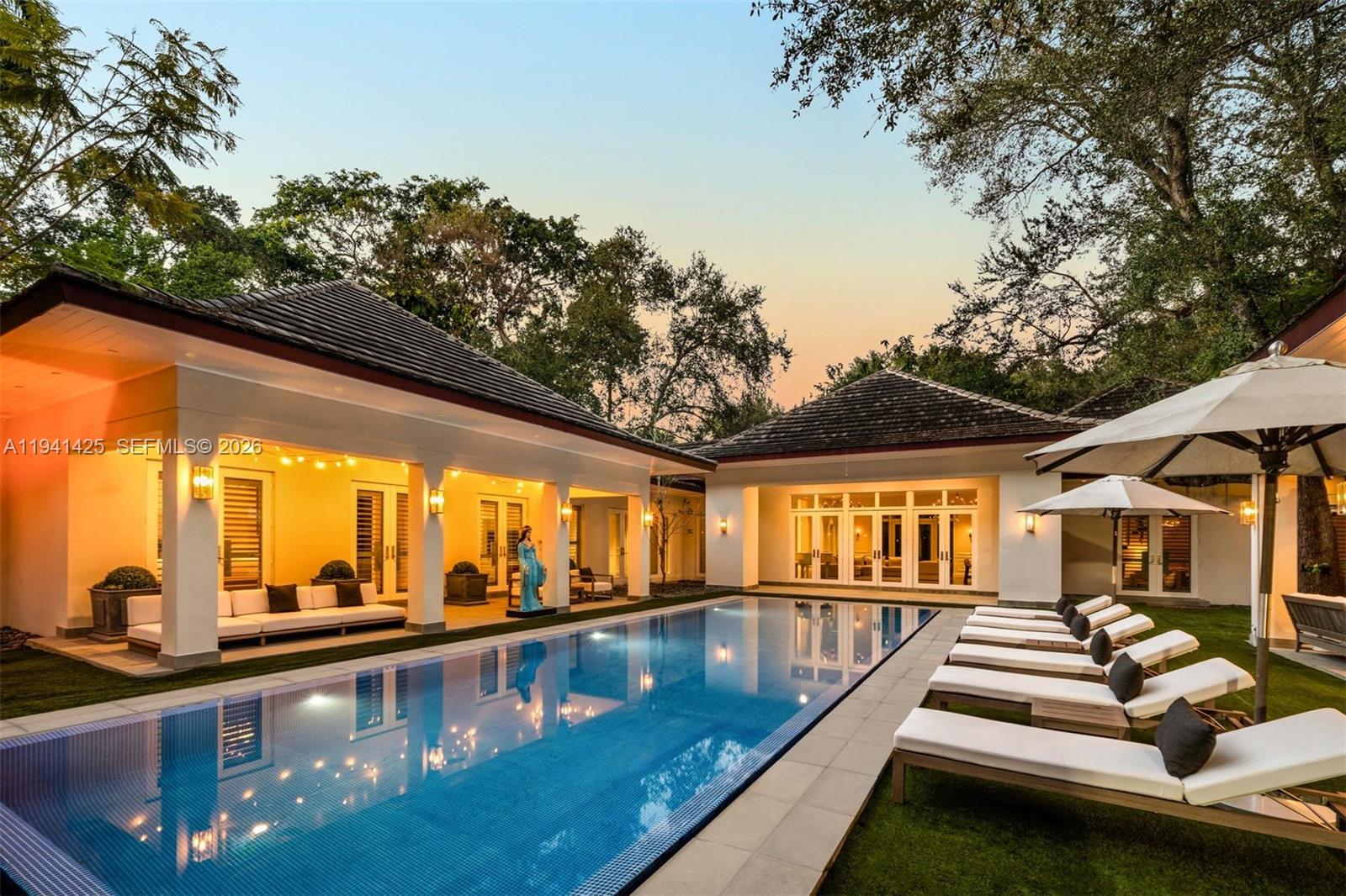 4100 Kiaora Street Miami, FL 33133 - Photo 23 of 26 a view of swimming pool with outdoor seating