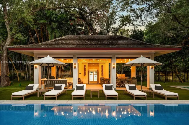 a view of house with patio outdoor seating