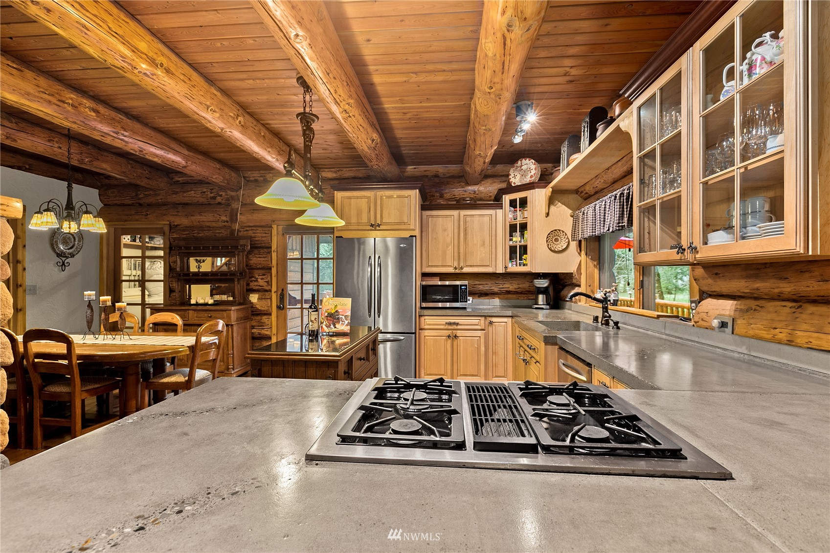 9455 Heady Road Sumas, WA 98295 - Photo 16 of 39 a kitchen with stainless steel appliances granite countertop a stove and a wooden cabinets