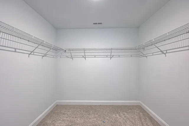 a view of a room with racks on the wall
