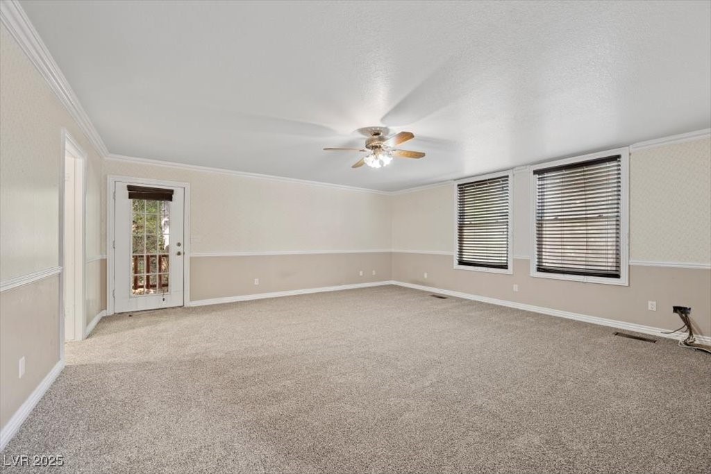 360 Echo Road Mount Charleston, NV 89124 - Photo 17 of 75 Main-level primary suite w/deck access, a separate tub & shower + a walk-in closet.
