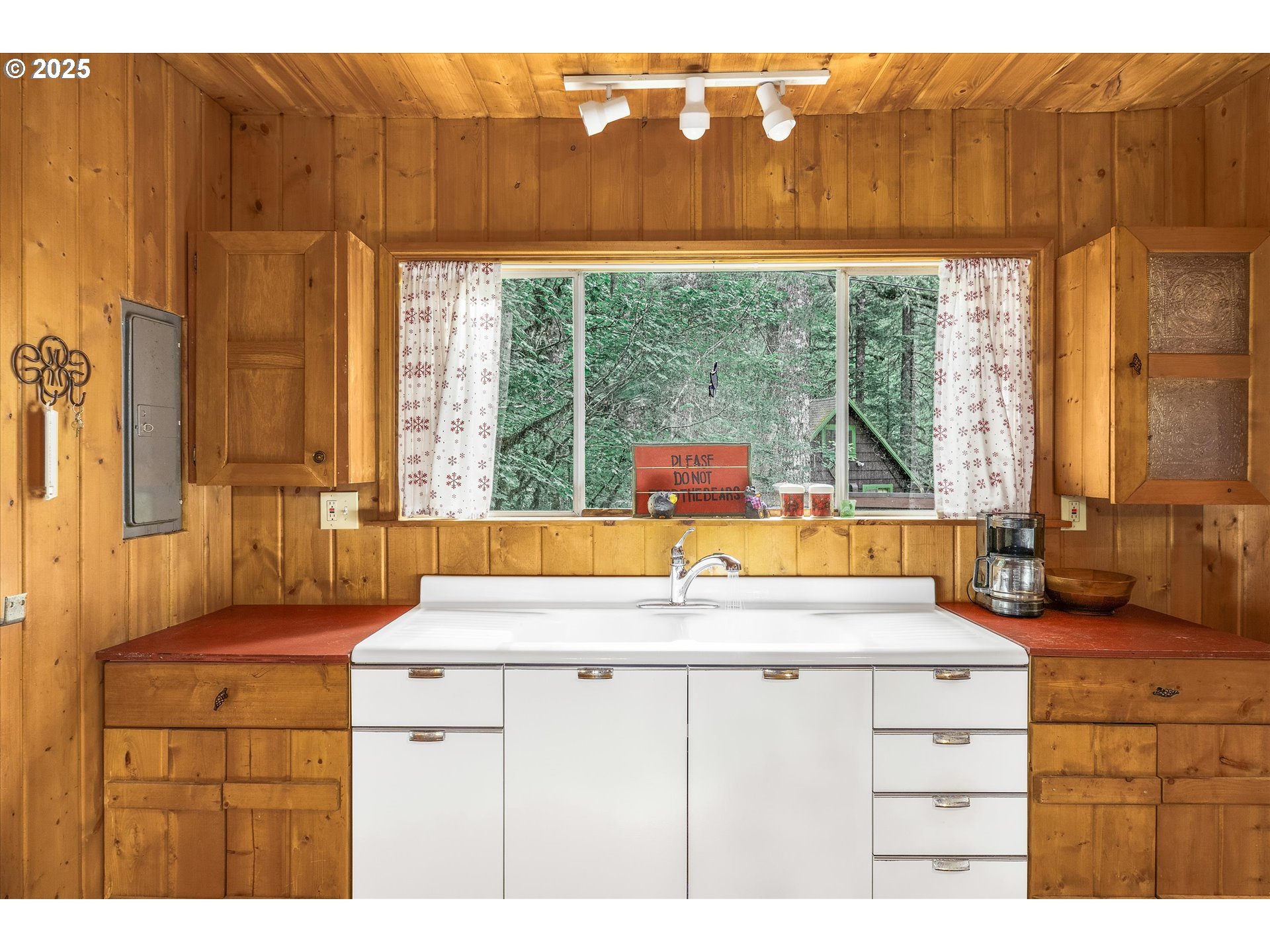 75125 Mt Hood Highway Rhododendron, OR 97049 - Photo 15 of 43 a bathroom with a sink and a large mirror