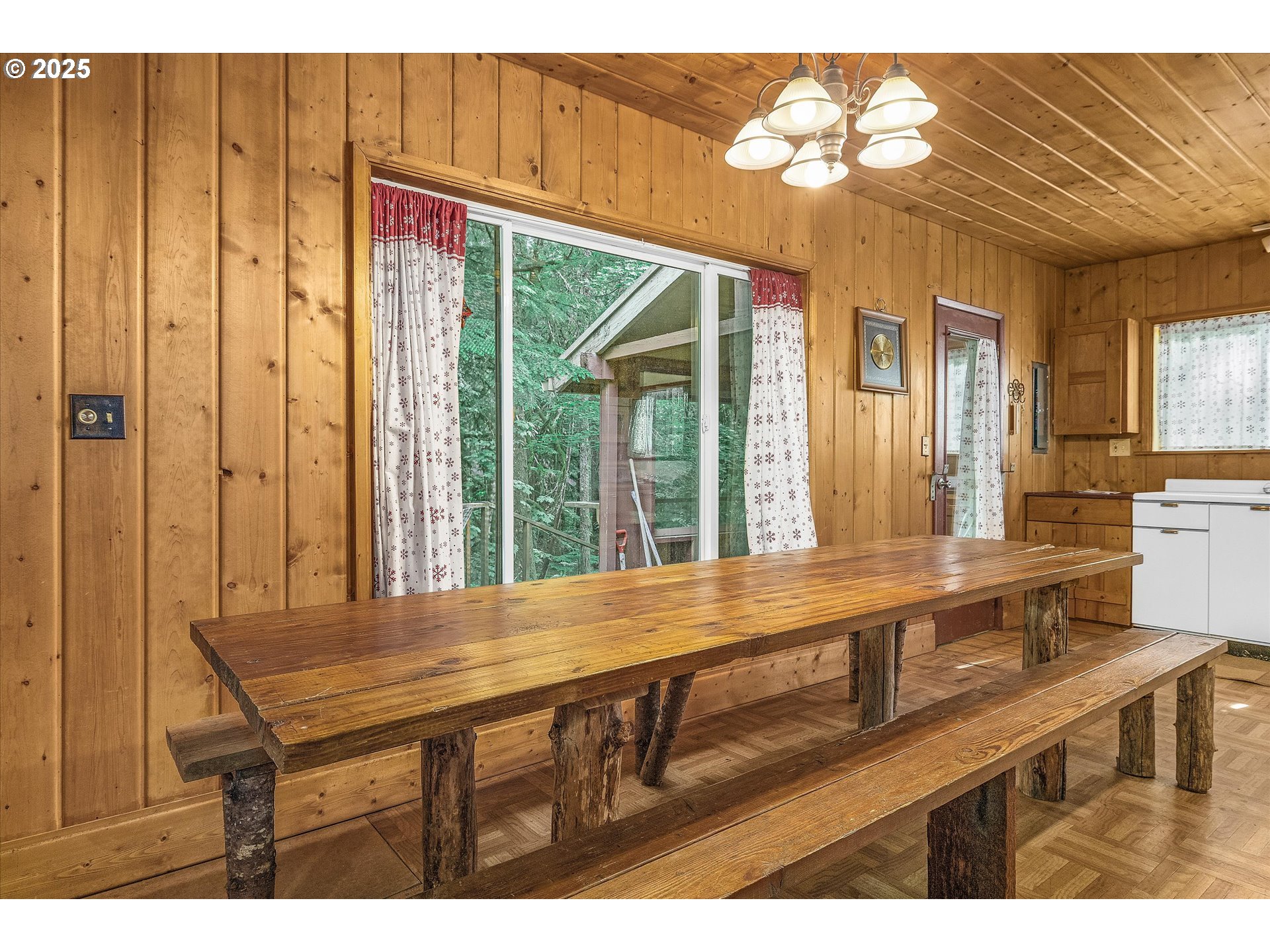 75125 Mt Hood Highway Rhododendron, OR 97049 - Photo 17 of 43 a view of a dining room with furniture window and outside view
