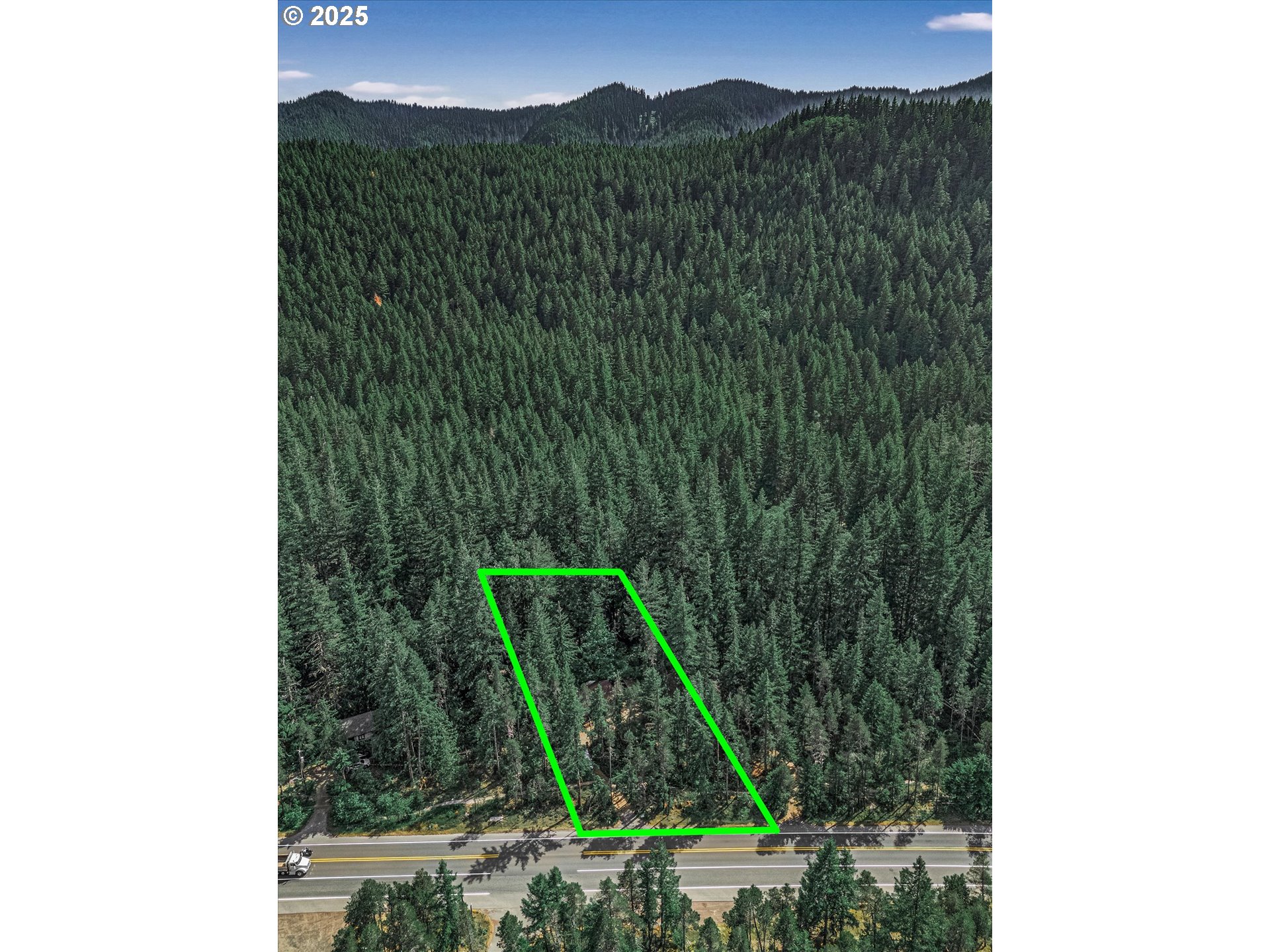 75125 Mt Hood Highway Rhododendron, OR 97049 - Photo 39 of 43 a view of a yard in front of a house